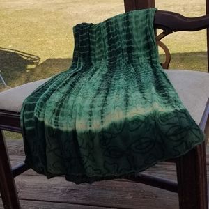 Tie dyed scarf in shades of green.